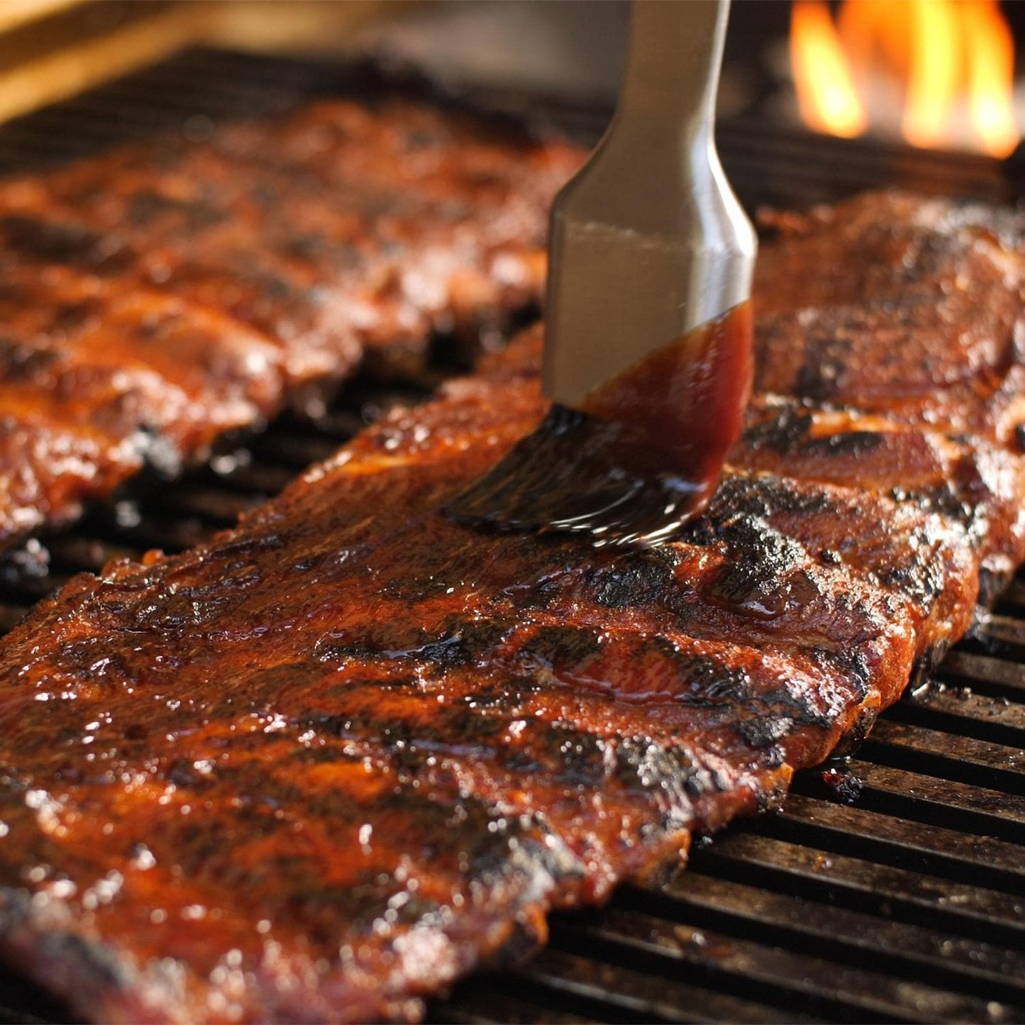 Fire Magic - C430S-RT1P-G6 - Choice 24-Inch Propane Gas Grill On In-Ground Post - Saucing Ribs