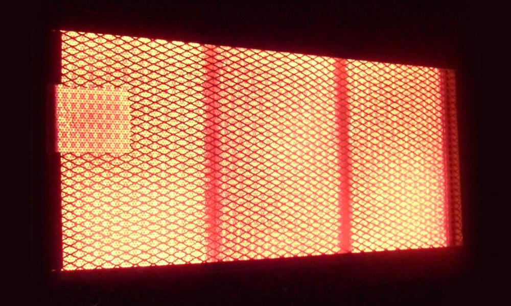 Bull Infrared Searing Burner for Angus, Brahma, Diablo, Outlaw, Steer, & Lonestar Gas Grills - 20505 - glowing red during operation.