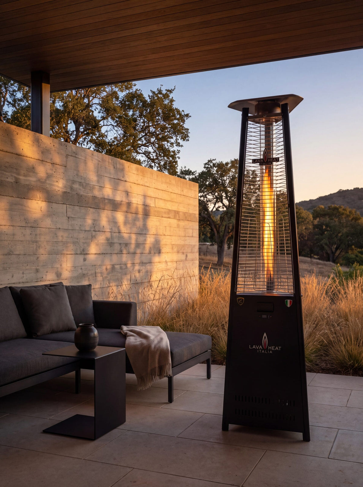 Lava Heat Italia 2G Flame Tower patio heater in Hammered Black – outdoor setting