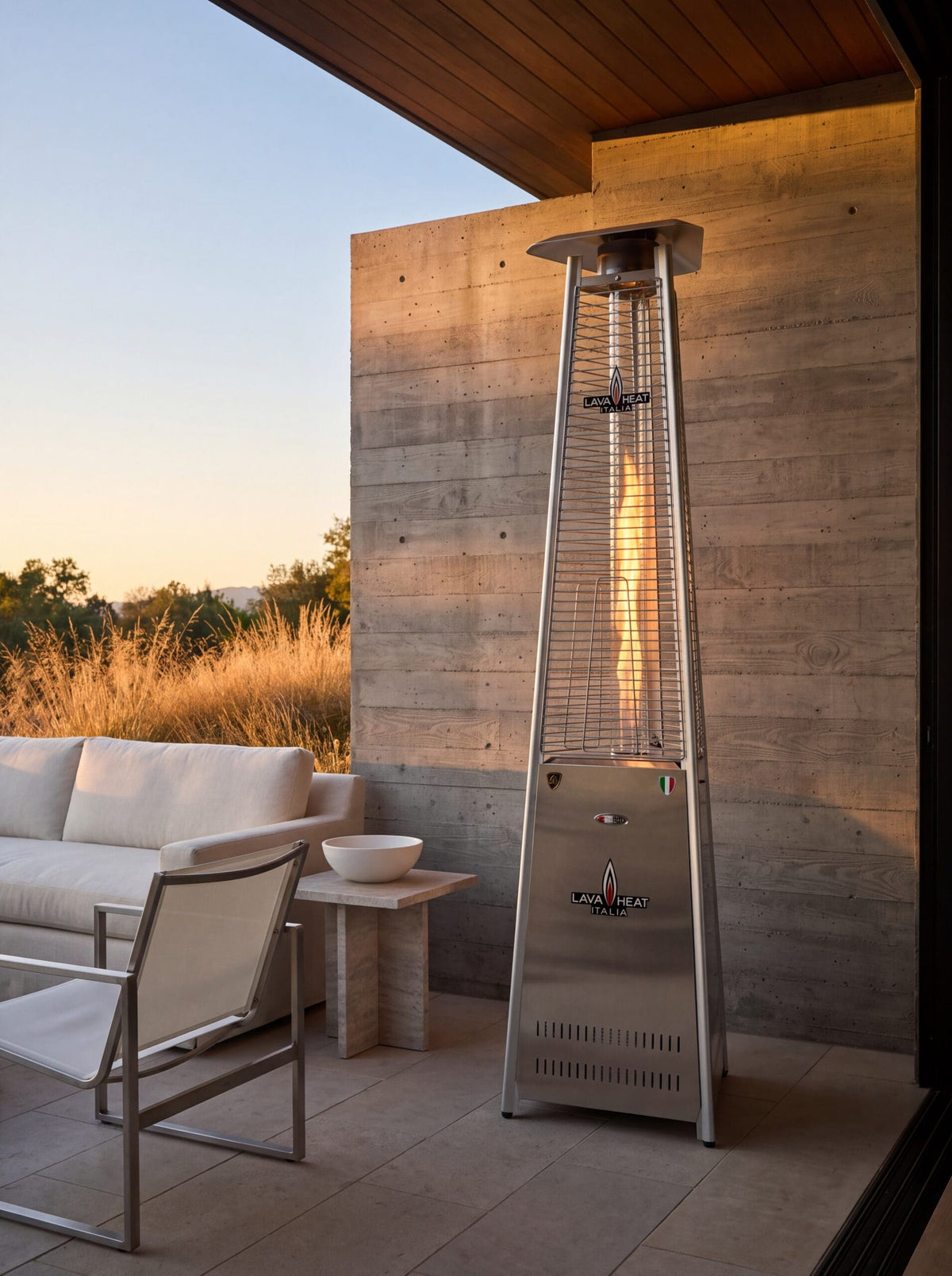 Lava Heat Italia 2G Flame Tower patio heater in Stainless Steel – outdoor setting
