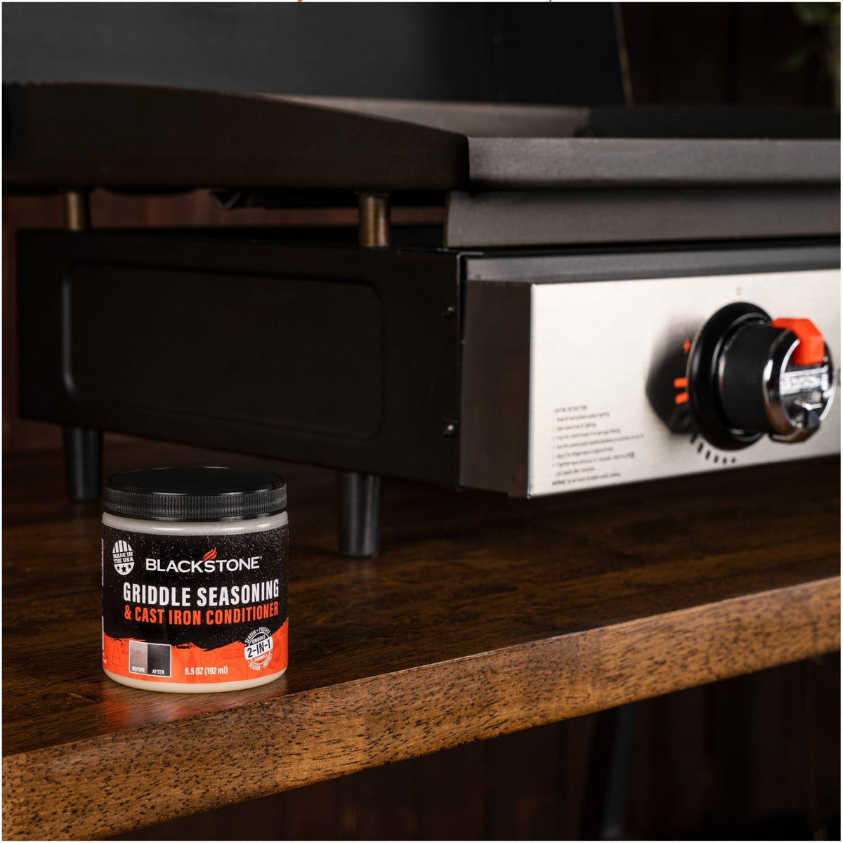 Blackstone griddle seasoning and cast iron conditioner, tub beside a griddle