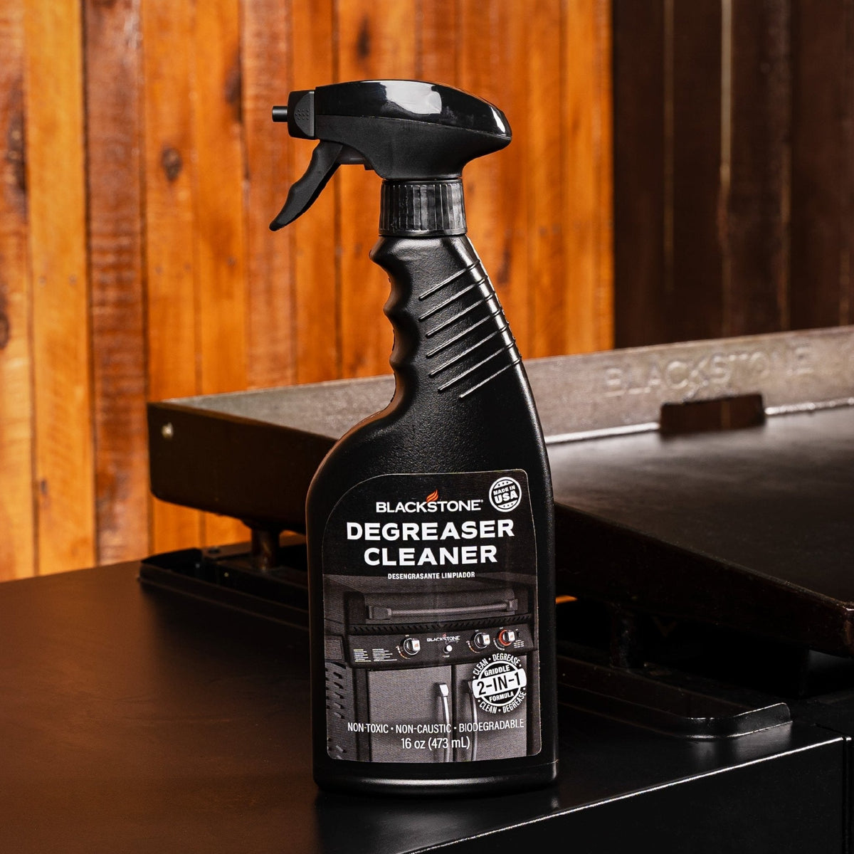 Blackstone griddle degreaser and cleaner spray, bottle on a griddle