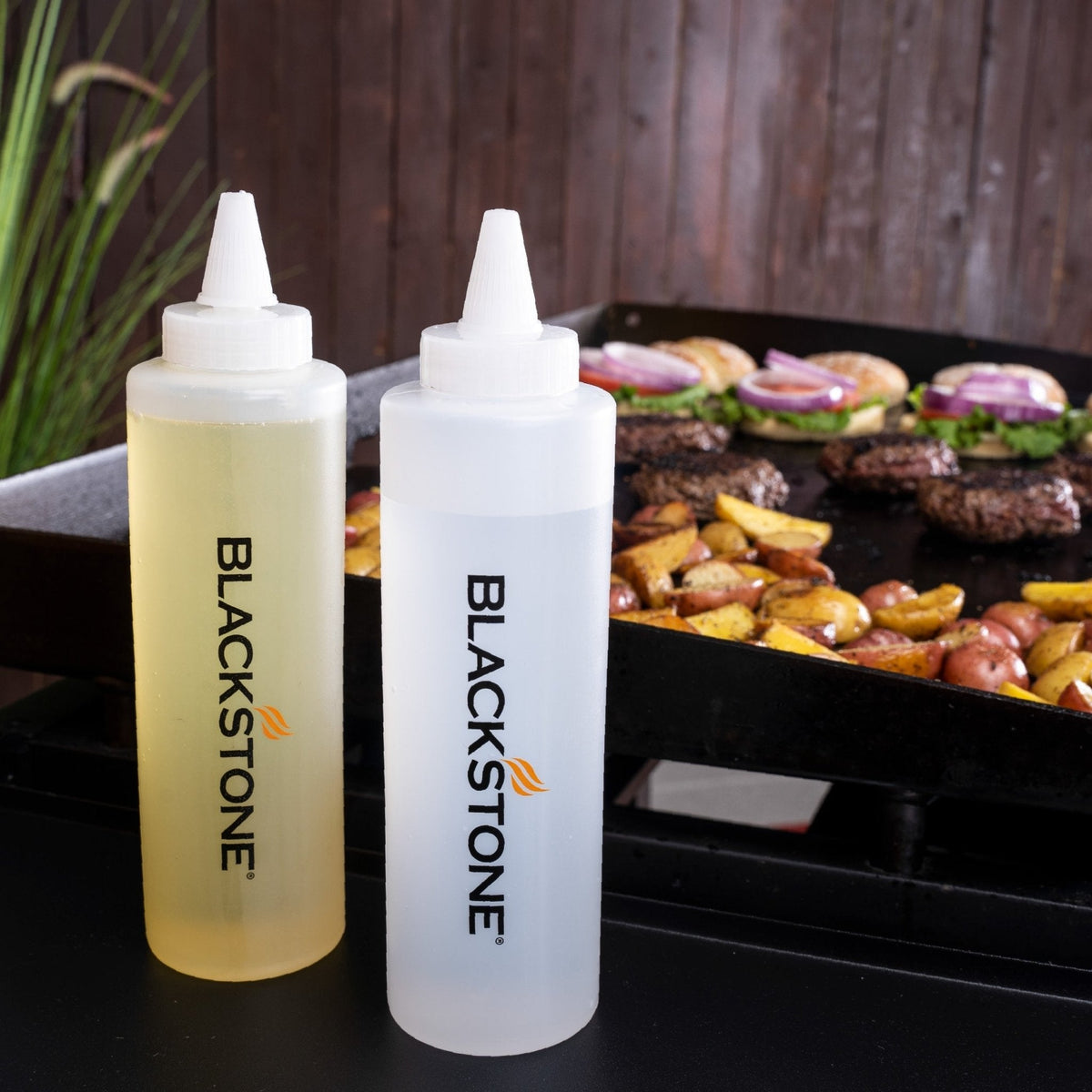 Blackstone 5-piece griddle toolkit, squeeze bottles on the griddle