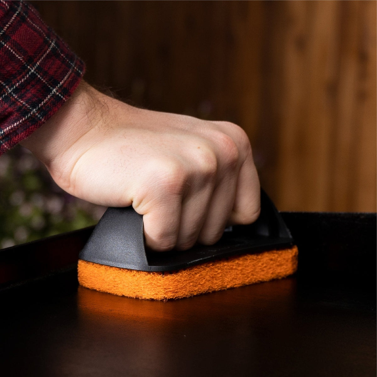 Blackstone griddle cleaning kit, scrub pad in use