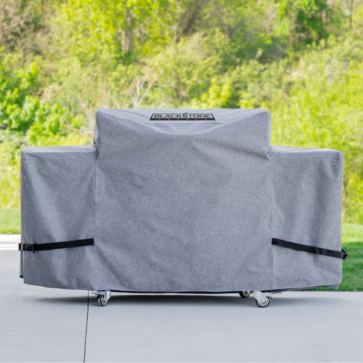 Blackstone Select 36-inch griddle cover, on a griddle outdoors