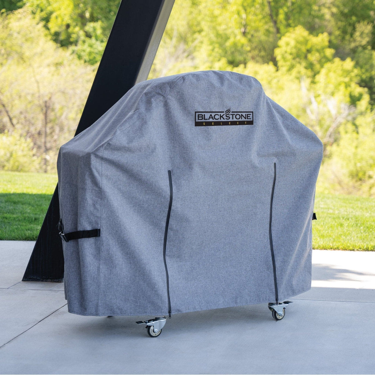 Blackstone Select pizza oven cover, on the oven outdoors