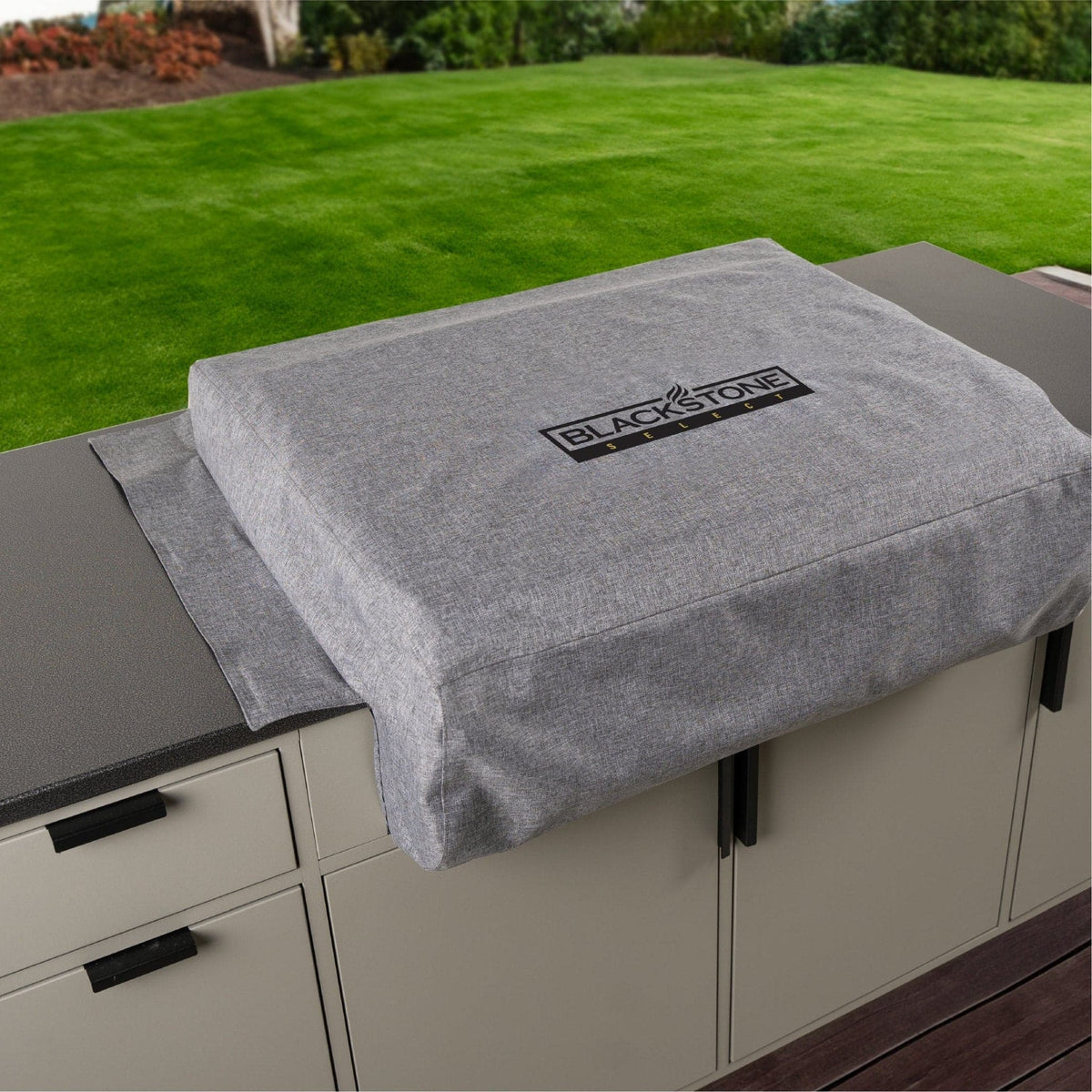 Blackstone 28-inch XL drop-in griddle cover, on an outdoor kitchen countertop