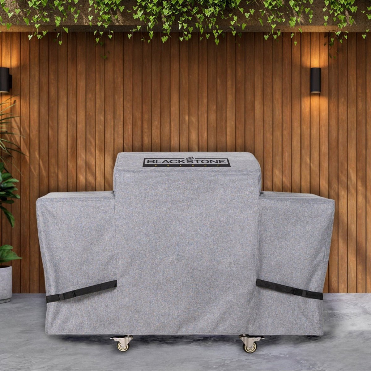 Blackstone Select 28-inch griddle cover, on a griddle outdoors