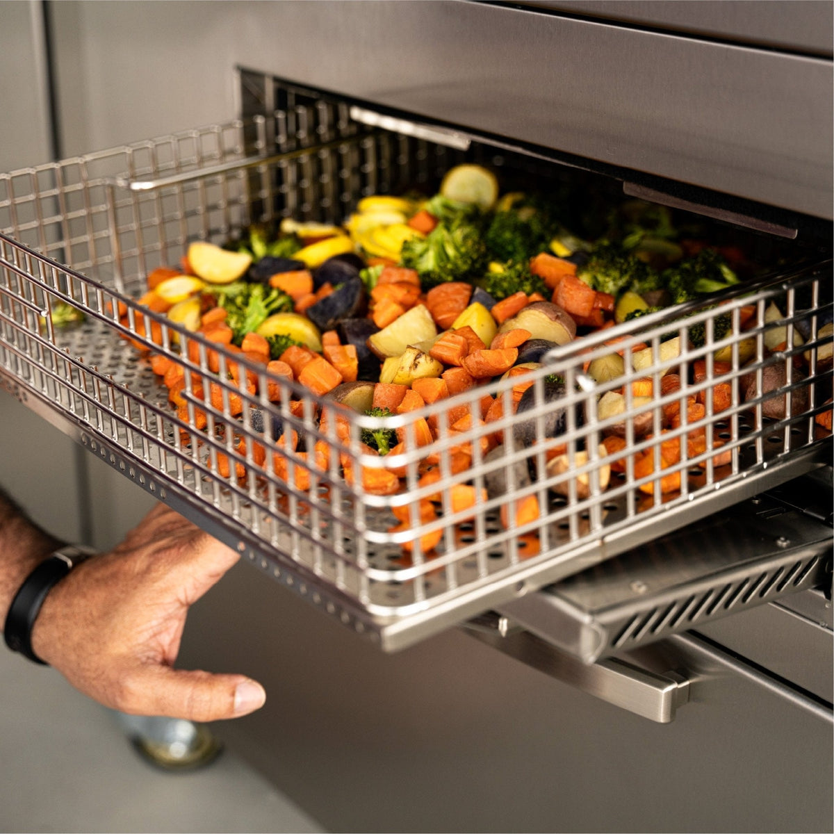 Blackstone Select 36-inch griddle with air fryer, air fryer basket with vegetables