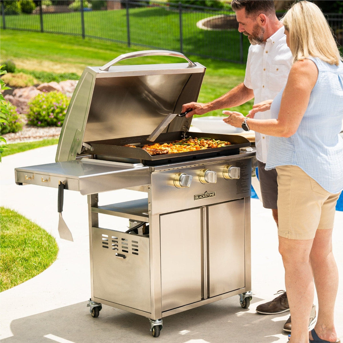 Blackstone Select 28-inch griddle with cabinet, cooking for a group
