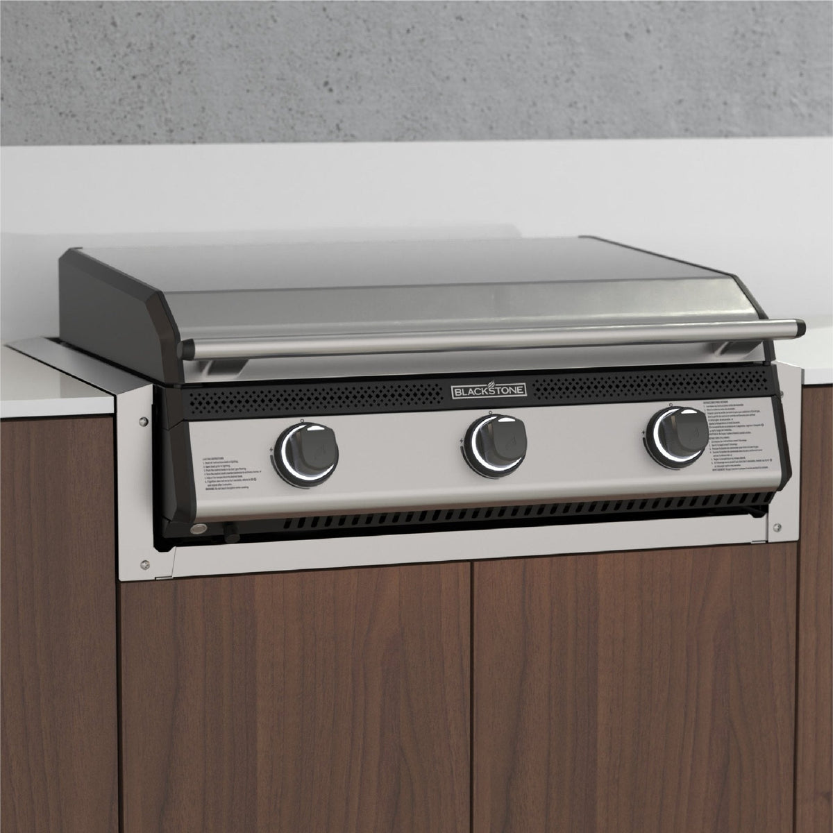 Blackstone 28-inch drop-in griddle insulating jacket, installed in an island with the griddle in place