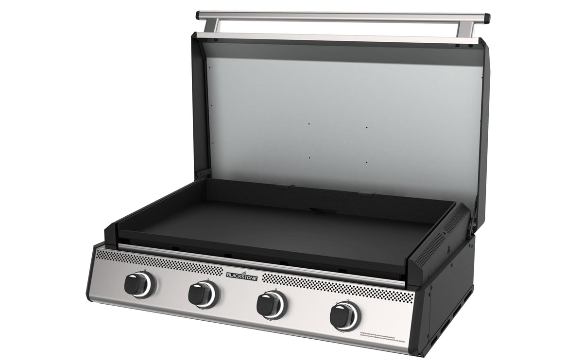 Blackstone 36-inch built-in griddle with hood, angled view with hood open