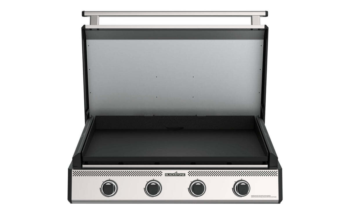 Blackstone 36-inch built-in griddle with hood, hood open showing the griddle plate