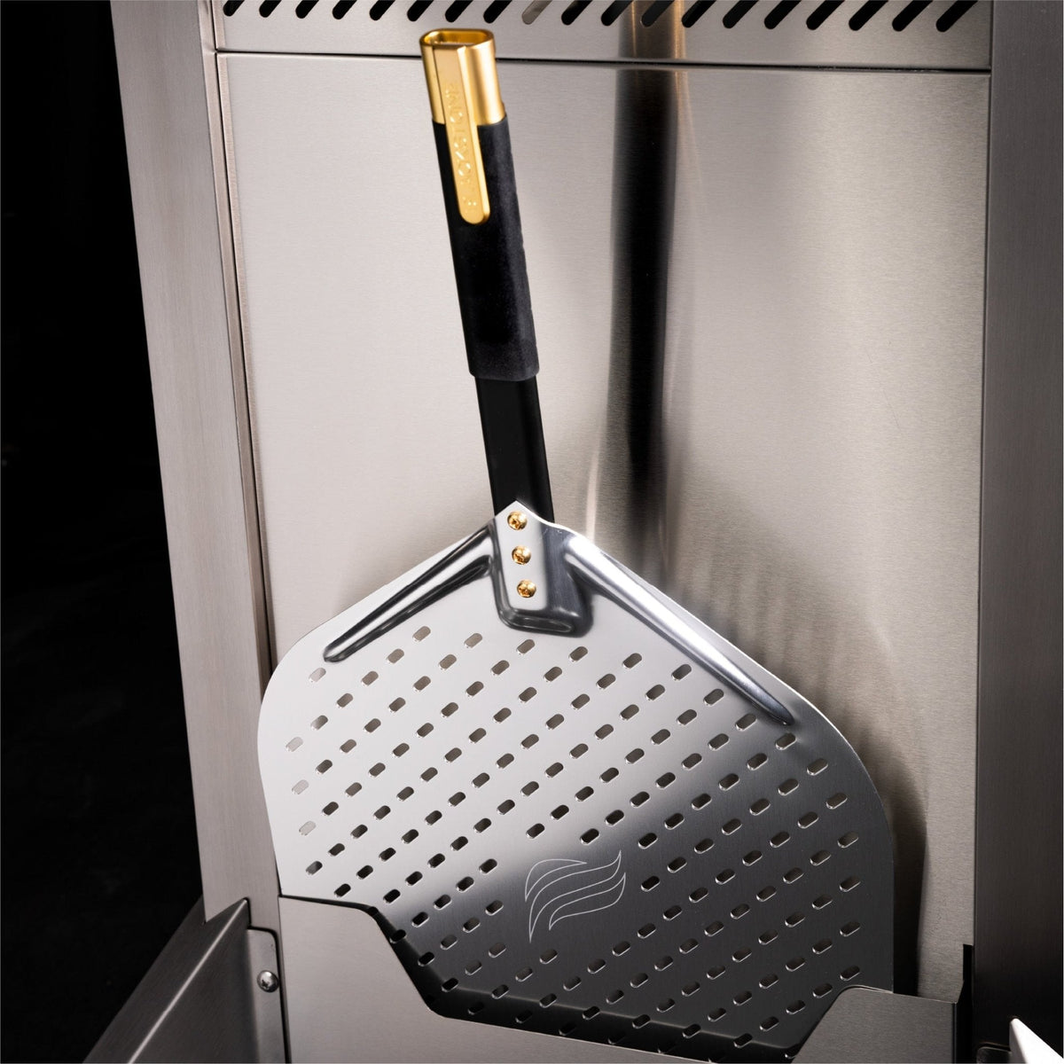 Blackstone Select pizza oven with cart, included pizza peel in its holster