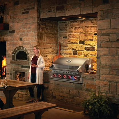 Napoleon BIG38RBSS-1 Grill - Standing By Fireplace - Lifestyle