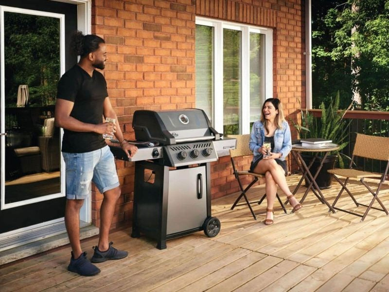 Napoleon Freestyle 365 Freestanding 3-Burner Gas Grill - Graphite Grey - F365DGT - Man Stand Next to Grill