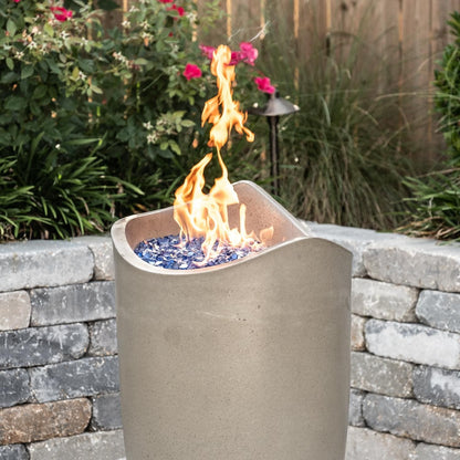 American Fyre Designs Wave 20-inch Fire Urn - Smoke - |
Lifestyle - Shown with Alpine Flame Sky Blue Fire Glass (Sold Separately)