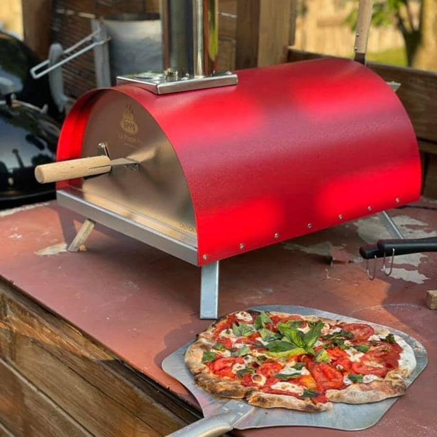 WPPO Le Peppe Portable Red Wood Fired Pizza Oven with Peel - WKE-01-RED - Baking Pizza - Lifestyle