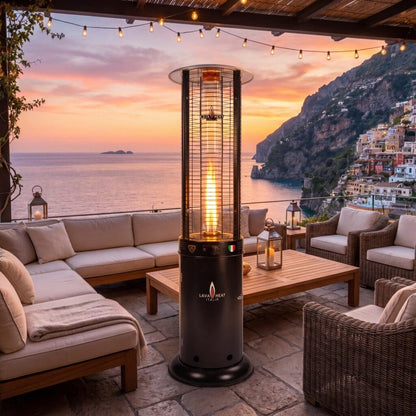 Lava Heat Opus Round Flame Tower Heater 80.5-inch 56 K BTU Remote Control Push Button Ignition Hammered Black Liquid Propane - RL7RPBL - Outdoor Evening View