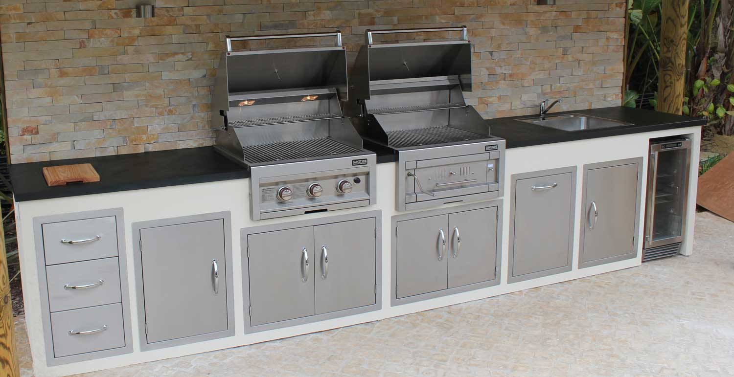 Sunstone 17" Flush Drawer & Paper Holder Combo - A-DPCF - Outdoor kitchen with metal cabinets and a grill.